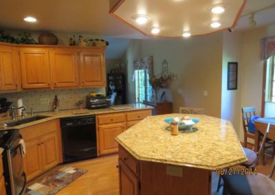 A custom kitchen counter and island granite counter top installation.