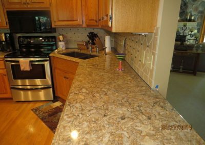 Custom granite countertop and kitchen sink system.
